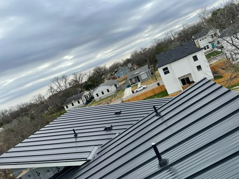 Standing seam metal roof panels with vents for Skylight Repair in Meadowbrook